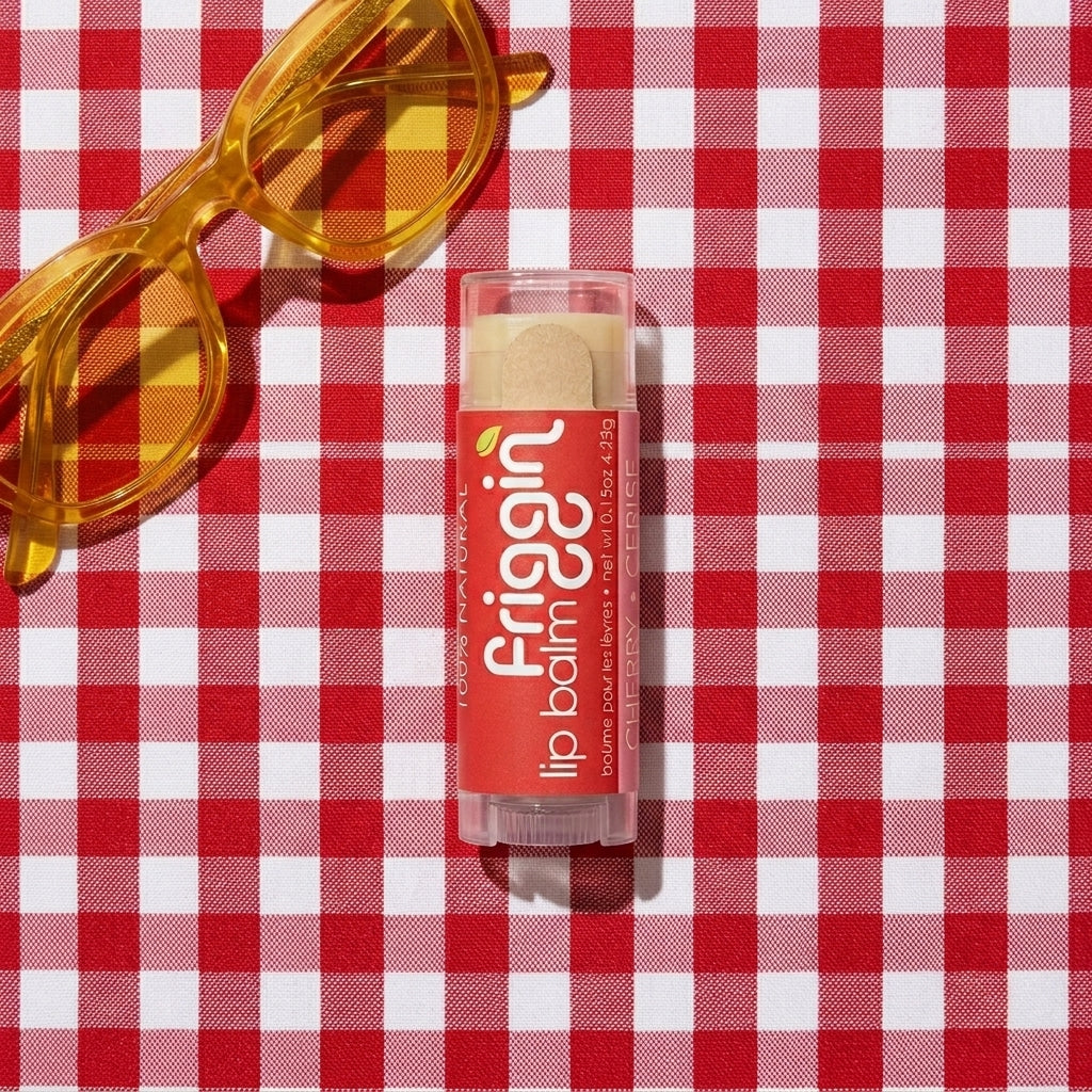 Cherry natural lip balm product photo with nourishing ingredients.