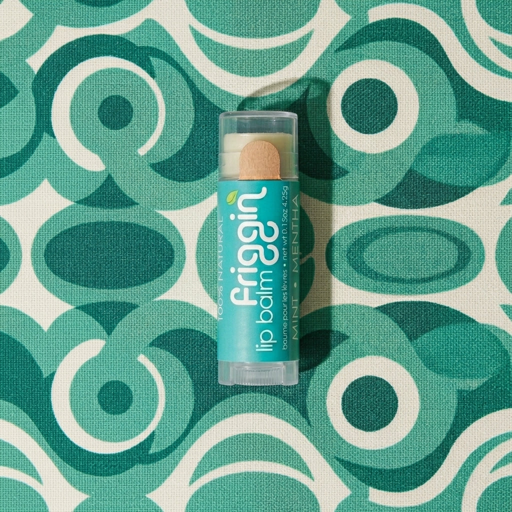 Mint natural lip balm product photo with nourishing ingredients.