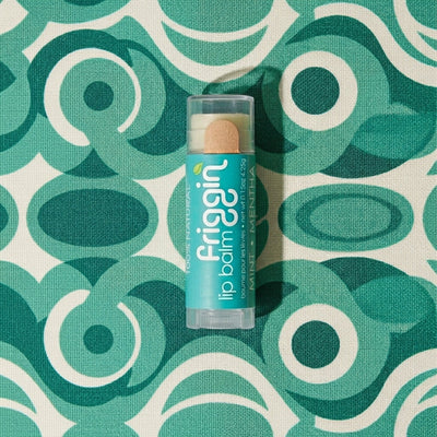 Mint natural lip balm product photo with nourishing ingredients.